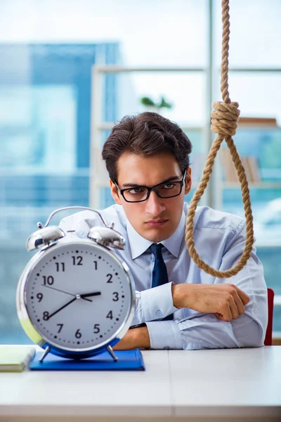 Unhappy businessman thinking of hanging himself in the office — Stock Photo, Image