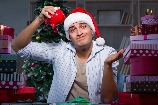 Man med många julklappar i lådor — Stockfoto