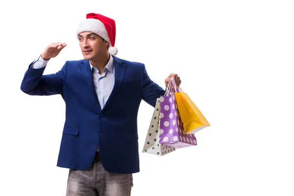 Giovane uomo con borse dopo lo shopping di Natale su sfondo bianco — Foto Stock