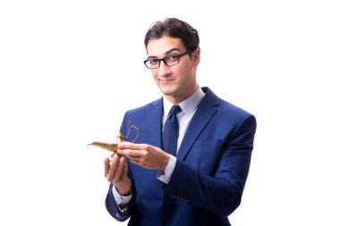 Sihirli lambası olan iş adamı beyazda izole edilmiş.