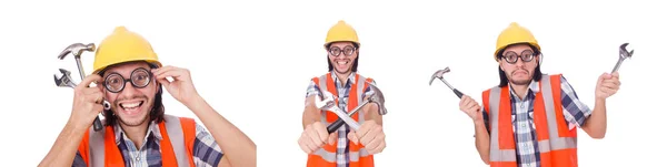 Funny construction worker with hammer and wrench isolated on whi