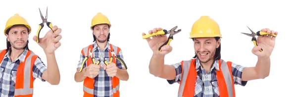 Jeune ouvrier de la construction avec des pinces isolées sur blanc — Photo