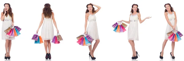 Set di donna con shopping bags su bianco — Foto Stock