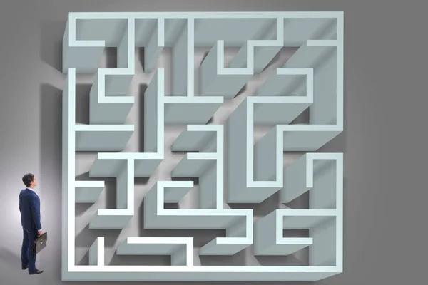 Businessman is trying to escape from maze labyrinth