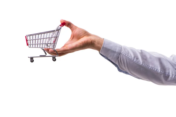 Mão segurando carrinho de compras isolado no branco — Fotografia de Stock
