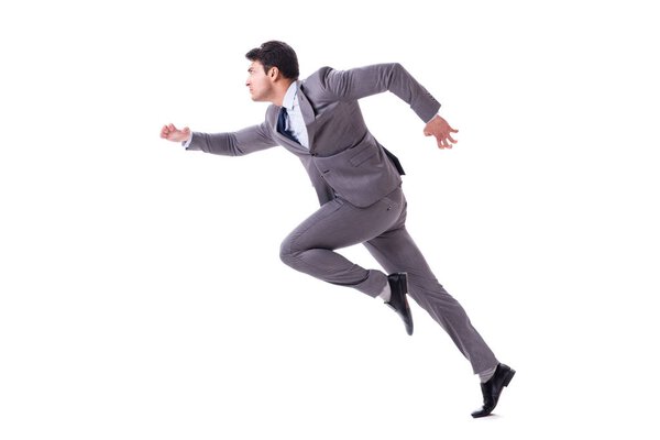 Young businessman running forward isolated on white