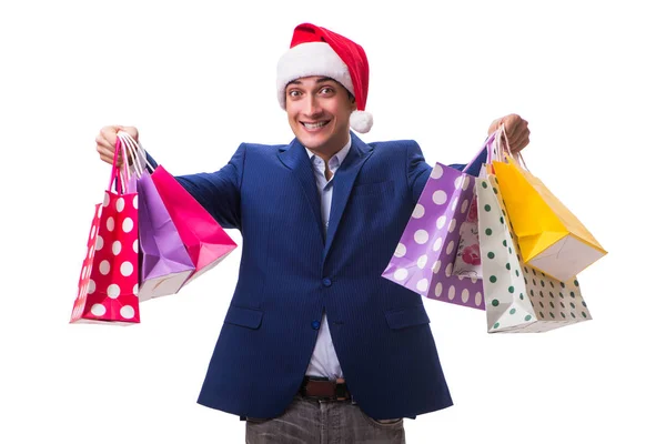 Młody człowiek z torbami po świątecznych zakupach na białym tle — Zdjęcie stockowe
