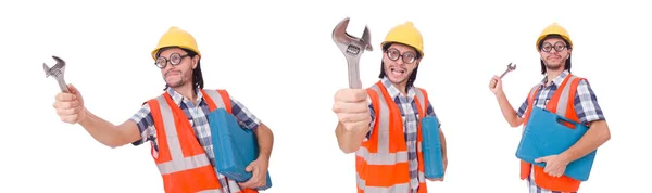 Srandovní mladý stavební dělník s nástrojů a klíč izolovaný — Stock fotografie