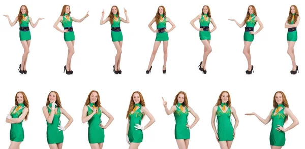 Молода сексуальна дівчина в зеленій сукні ізольована на білому — стокове фото
