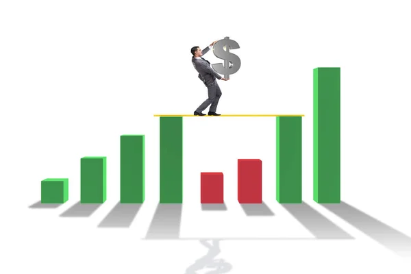 Ung affärsman i affärsidé med stapeldiagram — Stockfoto