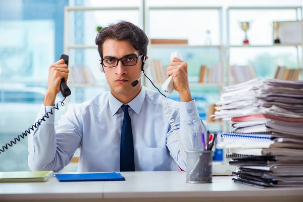 Unhappy angry call center worker frustrated with workload