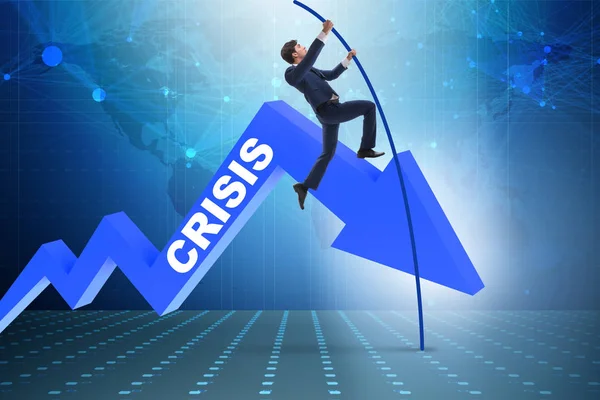 Zakenman polsstokhoogspringen boven crisis in business concept — Stockfoto