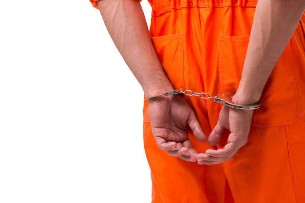 Handcuffed handsome businessman isolated on white background