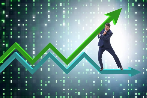 Geschäftsmann unterstützt Wachstum der Wirtschaft in Diagramm — Stockfoto