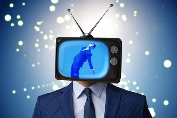 Férfi televíziós fejjel a tv-függőség fogalmában — Stock Fotó