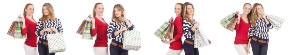 Amici con shopping bags isolati su bianco — Foto Stock