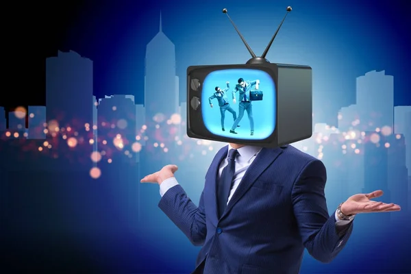 Man with television head in tv addiction concept