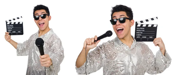 Joven con micrófono y clapperboard aislado en blanco — Foto de Stock