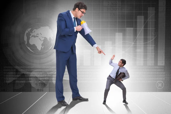 Bad angry boss shouting at employee with loudspeaker — Stock Photo, Image