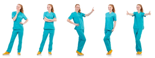 Mujer-médico sonriente en uniforme aislado en blanco —  Fotos de Stock