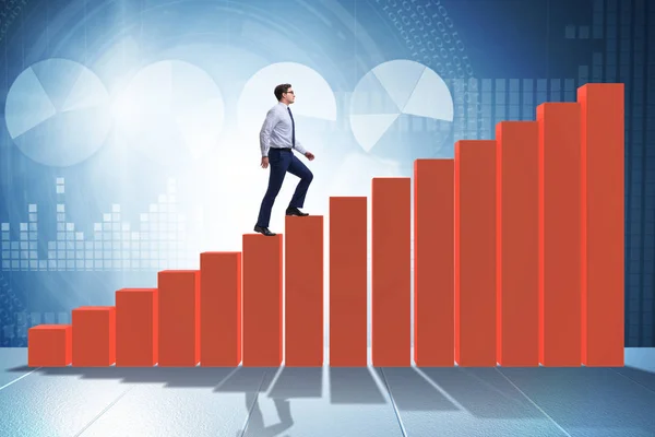 Businessman going up the bar chart in growth concept — Stock Photo, Image