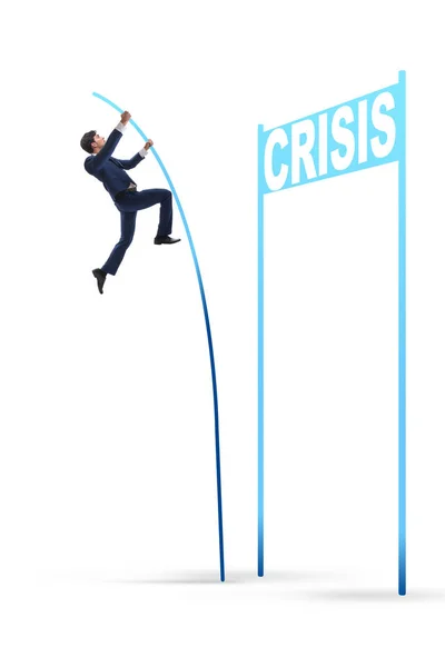 Affärsman pole vaulting över krisen i affärsidé — Stockfoto