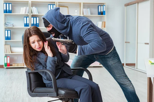 Criminal taking businesswoman as hostage in office — Stock Photo, Image