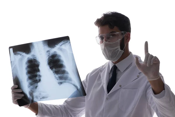 Jeune médecin regardant des images radiographiques isolées sur blanc — Photo