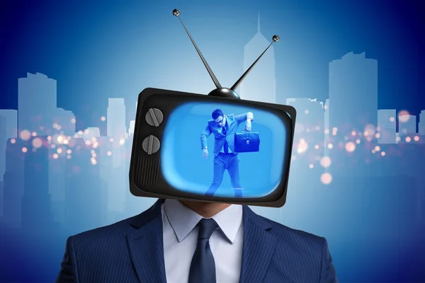 Man with television head in tv addiction concept