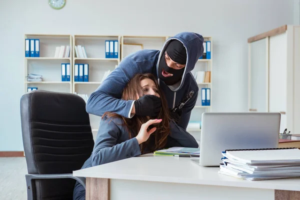 Criminal taking businesswoman as hostage in office Stock Photo by ...