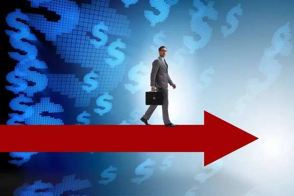 Empresario con dólar caminando en el signo de flecha —  Fotos de Stock