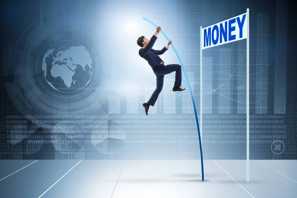 Businessman jumping over money in business concept — Stock Photo, Image