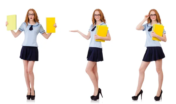 Junge fleißige Studentin mit Schulbüchern auf weißem Grund — Stockfoto