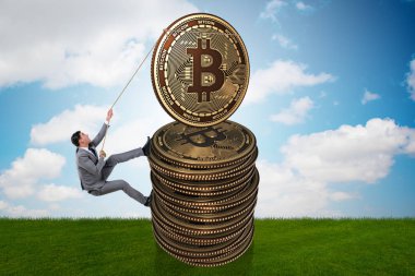 İş adamı bitcoin yığınına tırmanıyor