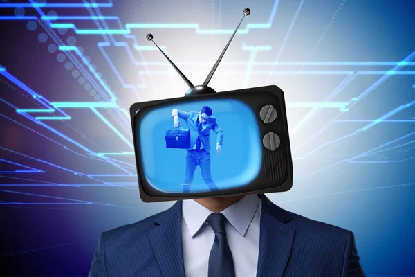 Man with television head in tv addiction concept