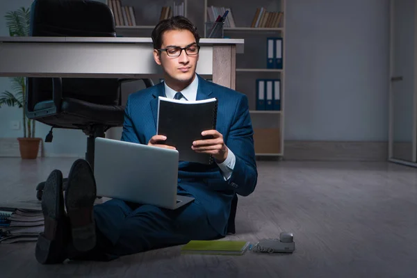 Businessman working overtime long hours late in office — Stock Photo, Image