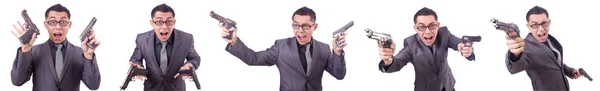 Смішний бізнесмен з пістолетом на білому — стокове фото
