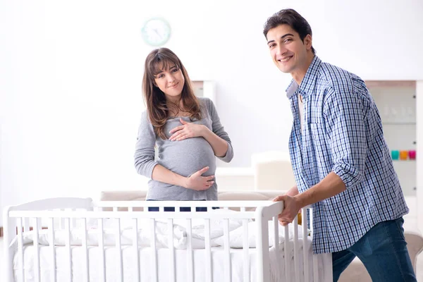 Young parents expecting their first baby — Stock Photo, Image