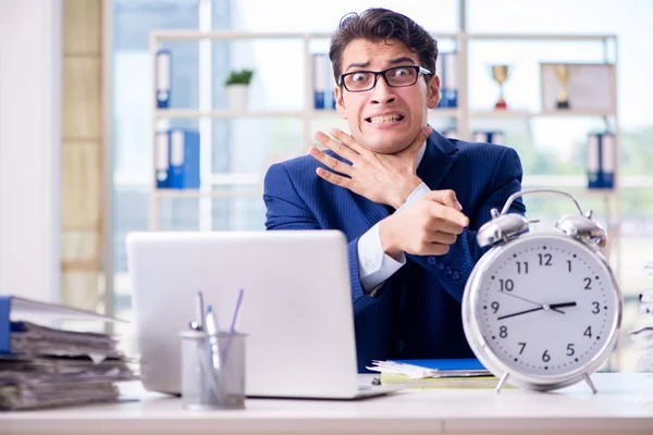 Businessman with giant clock failing to meet deadlines and missi — Stock Photo, Image