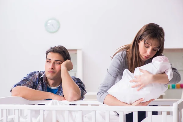 Young dad cannot stand baby crying — Stock Photo, Image