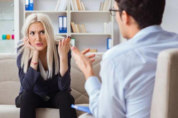 Young woman visiting psychiatrist man doctor for consultation — Stock Photo, Image