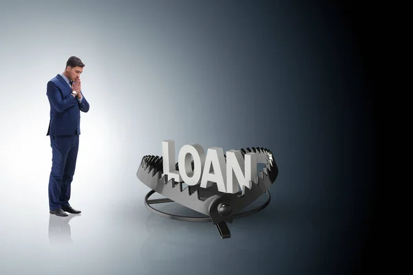 Businessman falling into the trap of loan credit — Stock Photo, Image