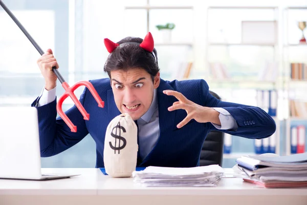 Devil angry businessman in the office — Stock Photo, Image