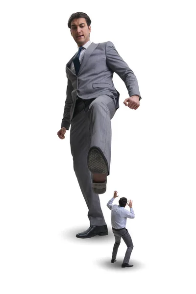 Bad angry boss kicking employee in business concept — Stock Photo, Image