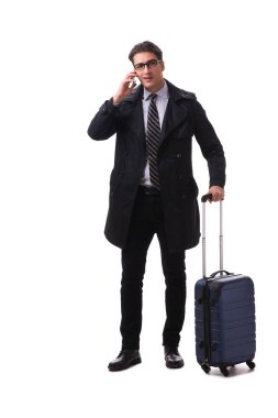 Bavullu genç işadamı beyaz üzerinde iş gezisine hazır.