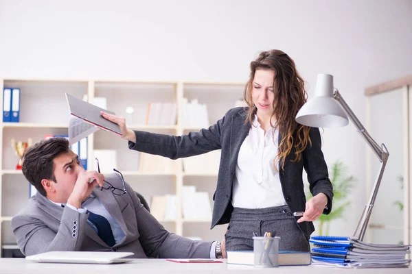 Sexual harassment concept with man and woman in office — Stock Photo, Image