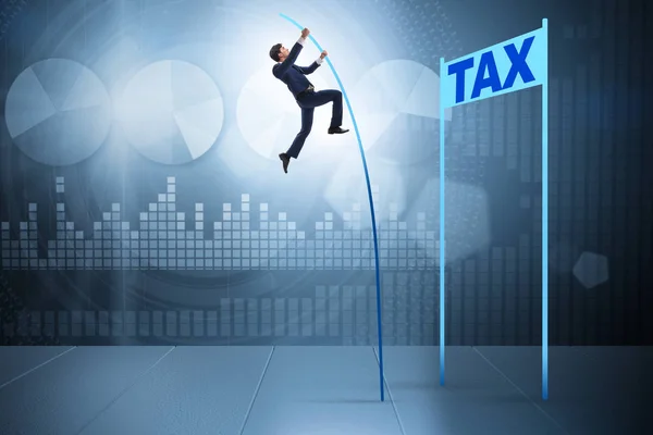 Businessman jumping over tax in tax evasion avoidance concept — Stock Photo, Image