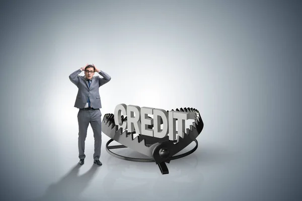 Businessman falling into the trap of loan credit — Stock Photo, Image