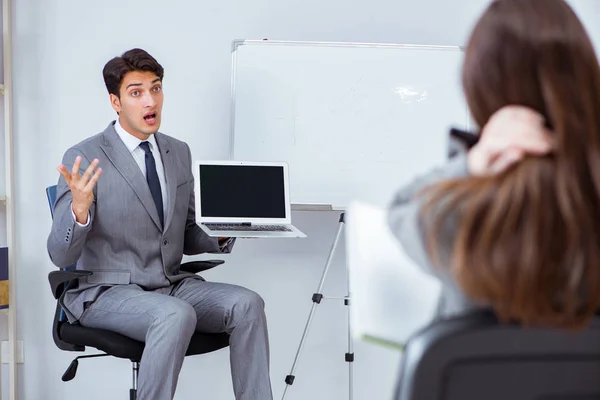 Business presentation in the office with man and woman — Stock Photo, Image