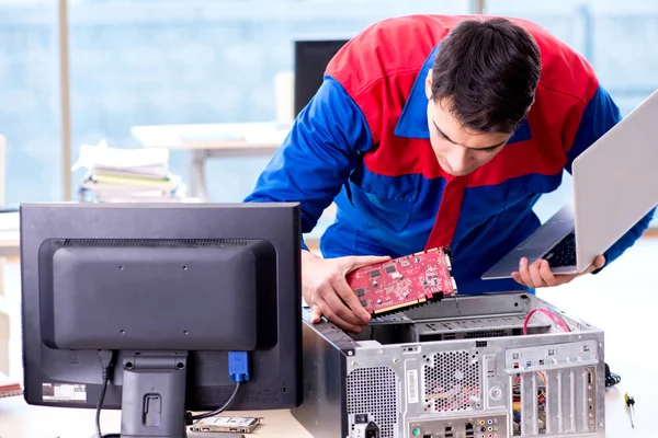 Computer repairman specialist repairing computer desktop